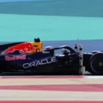 Red Bull Sets the Benchmark in F1, Says Mercedes Boss Wolff As Formula 1 pre-season testing kicks off in Bahrain, Mercedes team principal Toto Wolff has declared Red Bull as the team to beat this season. Lando Norris ended the first day of testing as the fastest driver, finishing 0.129 seconds ahead of Red Bull’s Max Verstappen. Despite this, Wolff believes Red Bull’s new engine gives them a clear advantage over rivals. Red Bull’s Engine Advantage Mercedes’ data shows Red Bull can deploy significantly more energy on the straights than other teams. Wolff explained that the team maintained a consistent advantage over 10 consecutive laps. “On a single lap, we’ve seen it before, but now they’re doing it over multiple laps,” Wolff said. “As of today, they have set the benchmark.” This season features the biggest rules overhaul in F1 history. Cars have new power units, chassis, tyres, and fuel. The 1.6-litre V6 turbo hybrid engines split power almost equally between internal combustion and electrical energy. Energy recovery and deployment are now key to performance. How Hybrid Engines Work The hybrid engines recover energy in four ways: braking, revving in corners, lifting off early, and harvesting while at full throttle. Teams must carefully manage energy deployment, as even small gains can determine competitiveness. Testing Times and Driver Performances Headline lap times during testing are often misleading because teams run cars in different specifications. Norris set his fastest lap on C2 tyres, while Verstappen used softer C3 tyres. Ferrari’s Charles Leclerc was third fastest, 0.521 seconds behind Norris, followed by Haas driver Esteban Ocon. Unlike most teams, Red Bull had Verstappen drive all day. Aston Martin also limited driving to Lance Stroll, marking the start of their Honda engine partnership and debuting a new car designed by Adrian Newey.