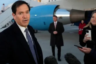 Rubio Signals Shift in US Foreign Policy at Munich Security Conference US Secretary of State Marco Rubio said the world is entering a new phase in global politics as he arrived in Germany for the Munich Security Conference. He described this moment as a turning point and urged allies to rethink their roles in a fast changing international system. Rubio is leading the US delegation at the first major global forum since President Donald Trump renewed his controversial proposal to annex Greenland, a semi autonomous territory of Denmark. The proposal has raised serious concerns across Europe and has tested trust within the Nato alliance. Europe Reconsiders Its Security Dependence French President Emmanuel Macron has called on European nations to prepare for greater independence from the United States. He believes Europe must strengthen its own defence structure in case US support weakens. German Chancellor Friedrich Merz used his opening speech to urge Washington to rebuild transatlantic trust. He also confirmed that Germany and France are holding confidential talks about forming a joint European nuclear deterrent. At present, only France and the United Kingdom possess nuclear weapons in Europe. Many other European countries rely on the US nuclear umbrella under NATO for protection. Nato Secretary General Mark Rutte said the transatlantic bond remains strong and essential, despite political tensions. Greenland Dispute Adds Pressure Tensions increased after Trump claimed Greenland holds strategic value for US national security. He argued that Russian and Chinese ships operate heavily in the region, although he offered no clear evidence. Danish Prime Minister Mette Frederiksen plans to meet Rubio to address these concerns. Many European leaders see the Greenland issue as a serious challenge to alliance unity. Ukraine War and Peace Talks The war in Ukraine remains a top priority at the conference. Ukrainian President Volodymyr Zelensky said the meeting could lead to new steps that strengthen both Ukrainian and European security. Russia, Ukraine, and the United States have scheduled fresh peace talks in Geneva on 17 and 18 February. Earlier discussions in Abu Dhabi produced no breakthrough, although both sides carried out a prisoner exchange soon after. US China and Iran in Focus Rubio also met Chinese Foreign Minister Wang Yi on the sidelines of the conference. Washington and Beijing are trying to ease tensions over trade, tariffs, and Taiwan. Last week, Chinese President Xi Jinping described Taiwan as the most sensitive issue between China and the United States. He urged caution regarding US military support for the island. Iran’s nuclear programme is another key topic. Tehran insists its programme serves peaceful purposes. However, Trump has warned that the US could consider military action if Iran refuses to agree to a new nuclear deal. A Defining Moment for the Transatlantic Alliance The Munich Security Conference gathers around 50 global leaders this year. Discussions focus on European defence, Nato’s future, and the strength of US alliances. Many experts believe US foreign policy changes have already reshaped global dynamics. The coming months may determine whether transatlantic cooperation grows stronger or faces deeper strain.