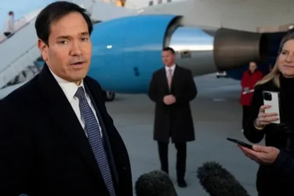 Rubio Signals Shift in US Foreign Policy at Munich Security Conference US Secretary of State Marco Rubio said the world is entering a new phase in global politics as he arrived in Germany for the Munich Security Conference. He described this moment as a turning point and urged allies to rethink their roles in a fast changing international system. Rubio is leading the US delegation at the first major global forum since President Donald Trump renewed his controversial proposal to annex Greenland, a semi autonomous territory of Denmark. The proposal has raised serious concerns across Europe and has tested trust within the Nato alliance. Europe Reconsiders Its Security Dependence French President Emmanuel Macron has called on European nations to prepare for greater independence from the United States. He believes Europe must strengthen its own defence structure in case US support weakens. German Chancellor Friedrich Merz used his opening speech to urge Washington to rebuild transatlantic trust. He also confirmed that Germany and France are holding confidential talks about forming a joint European nuclear deterrent. At present, only France and the United Kingdom possess nuclear weapons in Europe. Many other European countries rely on the US nuclear umbrella under NATO for protection. Nato Secretary General Mark Rutte said the transatlantic bond remains strong and essential, despite political tensions. Greenland Dispute Adds Pressure Tensions increased after Trump claimed Greenland holds strategic value for US national security. He argued that Russian and Chinese ships operate heavily in the region, although he offered no clear evidence. Danish Prime Minister Mette Frederiksen plans to meet Rubio to address these concerns. Many European leaders see the Greenland issue as a serious challenge to alliance unity. Ukraine War and Peace Talks The war in Ukraine remains a top priority at the conference. Ukrainian President Volodymyr Zelensky said the meeting could lead to new steps that strengthen both Ukrainian and European security. Russia, Ukraine, and the United States have scheduled fresh peace talks in Geneva on 17 and 18 February. Earlier discussions in Abu Dhabi produced no breakthrough, although both sides carried out a prisoner exchange soon after. US China and Iran in Focus Rubio also met Chinese Foreign Minister Wang Yi on the sidelines of the conference. Washington and Beijing are trying to ease tensions over trade, tariffs, and Taiwan. Last week, Chinese President Xi Jinping described Taiwan as the most sensitive issue between China and the United States. He urged caution regarding US military support for the island. Iran’s nuclear programme is another key topic. Tehran insists its programme serves peaceful purposes. However, Trump has warned that the US could consider military action if Iran refuses to agree to a new nuclear deal. A Defining Moment for the Transatlantic Alliance The Munich Security Conference gathers around 50 global leaders this year. Discussions focus on European defence, Nato’s future, and the strength of US alliances. Many experts believe US foreign policy changes have already reshaped global dynamics. The coming months may determine whether transatlantic cooperation grows stronger or faces deeper strain.