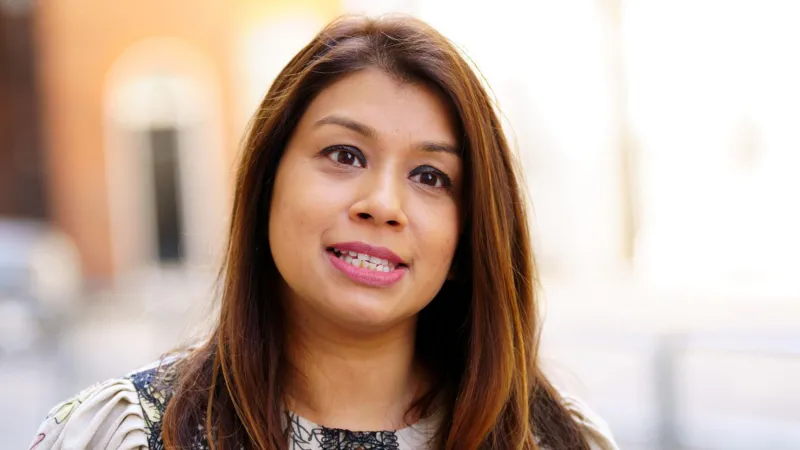 Former UK Treasury minister and Labour MP Tulip Siddiq has received a second prison sentence from a Bangladeshi court, deepening a legal dispute that has drawn strong criticism from the Labour Party. The court sentenced Siddiq to four years in jail on corruption charges. This punishment adds to a previous two year sentence handed down late last year. Judges also sentenced her aunt, former Bangladesh prime minister Sheikh Hasina, along with two other family members, in separate corruption cases. The court tried all defendants in absentia. Each of them denied the accusations. Labour Party condemns legal process Labour leaders quickly rejected the ruling and questioned the fairness of the trial. A party spokesperson said Siddiq never received proper details of the charges and had no chance to defend herself. According to Labour, Siddiq’s legal team made repeated requests to Bangladeshi authorities for information. Officials did not respond. The party stressed that every accused person deserves the right to legal representation. Because of these failures, Labour said it cannot accept the judgment. Background of earlier conviction In December 2025, a Bangladeshi court convicted Siddiq in another corruption case. Judges ruled that she influenced her aunt to use special executive powers to secure land on the outskirts of Dhaka. That conviction resulted in a two year prison sentence. Siddiq strongly rejected the ruling and described the entire process as deeply flawed. She said she remains confused by the case and claims Bangladeshi authorities have never contacted her directly, despite making allegations for more than a year. Resignation from UK government role Questions about Siddiq’s links to Sheikh Hasina led to her resignation from the UK government in January 2025. She stepped down as a Treasury minister after scrutiny over her use of London properties linked to allies of her aunt. The prime minister’s ethics adviser, Sir Laurie Magnus, reviewed the matter. He found no evidence of wrongdoing but said Siddiq should have shown greater awareness of reputational risks. In her resignation letter, Siddiq said she acted transparently but chose to step aside to avoid distracting the government. Political turmoil in Bangladesh Bangladesh launched the cases against Hasina and her family after her removal from power. Hasina ruled the country for 15 years before mass protests forced her out in August 2024. She later fled to India. In a separate case last year, a court sentenced her to death over crimes against humanity linked to a violent crackdown on student demonstrations.