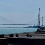 Former President Trump threatens to block the opening of the US-Canada Gordie Howe Bridge, citing US ownership and economic benefits.