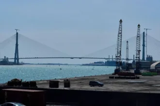 Former President Trump threatens to block the opening of the US-Canada Gordie Howe Bridge, citing US ownership and economic benefits.