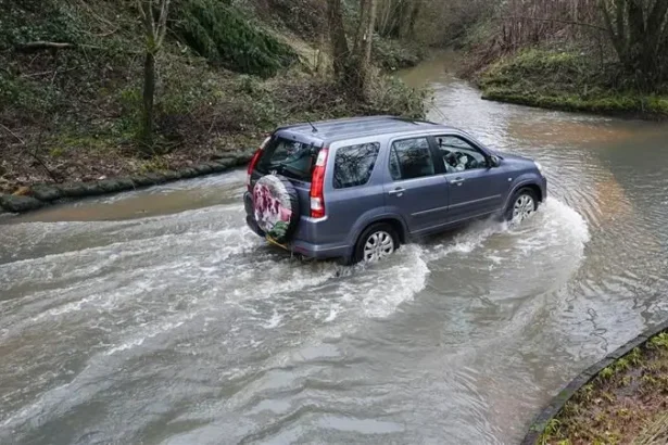 Are Wetter Winters and Frequent Flooding in the UK the New Normal? Heavy rain has soaked the UK again. From Cornwall to County Down, many areas recorded their wettest January ever. February brought more downpours, adding pressure to already saturated ground. Weather experts say this may not be a one off event. Wetter winters are becoming more common across the UK. Why Is So Much Rain Falling? Meteorologists link the recent flooding to a blocked weather pattern. A high pressure system over Scandinavia has trapped storm systems over the UK. As a result, rain clouds cannot move away easily. But this pattern tells a bigger story. Climate change plays a key role. When we burn fossil fuels such as coal and oil, we release greenhouse gases into the atmosphere. These gases trap heat and warm the planet. Even small temperature increases matter. For every 1°C rise in global temperature, the atmosphere can hold about 7 percent more moisture. More moisture means heavier rainfall. This is one reason the UK now faces more intense winter rain than in the past. Wet Winters Are Becoming More Frequent The Met Office reports that six of the ten wettest winters in nearly 250 years happened during this century. That is a clear shift. In the past, winters like 2023 to 2024 occurred roughly once every 80 years. Today, they happen about once every 20 years. If global warming continues, these extreme wet winters could become even more common. Natural weather patterns still influence UK rainfall. However, long term data shows a steady trend toward wetter winters. Rising Sea Levels Increase the Risk Rain is not the only concern. Sea levels around the UK have risen by about 20 centimeters since 1901. Warmer oceans expand. Melting glaciers also add more water. This rise may sound small, but it increases flood risk. When storms hit during high tide, coastal communities face stronger tidal surges. The combination of heavy rain and rising seas makes flooding worse. Communities and Farmers Feel the Pressure Flood warnings continue across the country. At one point this week, more than 100 areas faced official alerts. The Environment Agency confirmed that over 300 homes flooded. Farmers are under severe strain. One Somerset farmer said he is living on a knife edge. His crops sit in floodwater and may rot within days. Flooding also disrupts transport, damages homes, and threatens food supply chains. Insurance costs may rise. Infrastructure faces growing pressure. Are These Wetter Winters Here to Stay? Climate projections suggest yes. Unless greenhouse gas emissions fall sharply, the UK will likely see more wet winters and frequent flooding. Scientists warn that warming will intensify rainfall patterns further. The key question is no longer whether winters are changing. The focus now shifts to how communities adapt.