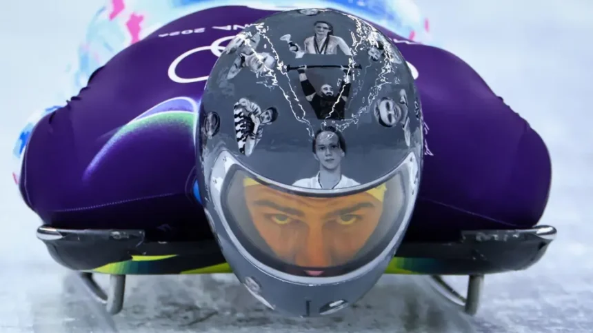 Ukrainian Skeleton Racer Wears Helmet Tribute Despite IOC Ban Ukrainian skeleton racer Vladyslav Heraskevych has chosen to wear a special helmet honoring athletes killed during Russia’s invasion of Ukraine, even after the International Olympic Committee (IOC) told him not to. He said he will continue wearing it on race days, insisting that the athletes he commemorates “deserve to be on the track.” Helmet Honors Fallen Athletes Heraskevych’s helmet features images of athletes, some of whom were his friends. Among them are teenage weightlifter Alina Peregudova, boxer Pavlo Ishchenko, and ice hockey player Oleksiy Loginov. He believes the helmet keeps their memories alive and highlights their connection to the Olympic movement. “Some of them were part of the Olympic family,” he said. “I believe they deserve to be here.” IOC Response and Rules The IOC has reminded Heraskevych that Rule 50.2 of the Olympic Charter prohibits political, religious, or racial propaganda in Olympic venues. Officials suggested wearing a black armband instead to honor the fallen athletes. IOC spokesperson Mark Adams said Heraskevych could show the helmet in mixed zones and on social media, but not while competing. He added, “We want him to compete. All athletes deserve their moment on the track.” The IOC has not confirmed if Heraskevych would face disqualification for continuing to wear the helmet. Athlete’s Stand Despite the IOC’s guidance, Heraskevych feels his helmet does not break the rules. He argued, “I believe we have all the rights to wear this helmet in competition because it is fully compliant with the rules. There aren’t enough black bands to honor all of these athletes.” Precedent of IOC Disqualifications The IOC has previously disqualified athletes for displaying political messages. For instance, Afghan breakdancer Manizha Talash, representing the Refugee Olympic Team in Paris 2024, was removed for wearing a 'Free Afghan Women' slogan during a pre-qualifier dance battle. Upcoming Races The men’s skeleton heats start Wednesday, with final runs scheduled for Friday. Heraskevych’s helmet tribute is set to draw attention while reminding the world of the lives lost during the invasion.