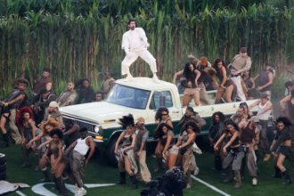 Bad Bunny performing at Super Bowl halftime show with Puerto Rican flag