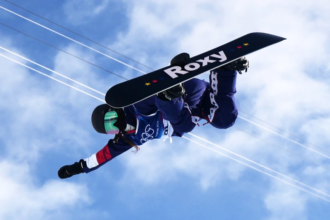 Chloe Kim competing in women’s snowboard halfpipe at the Winter Olympics