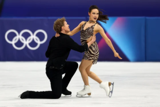 Madison Chock and Evan Bates performing ice dance at the Olympics