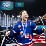 Hilary Knight celebrating Olympic gold after proposing to Brittany Bowe