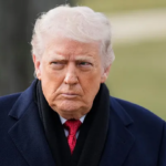 U.S. Navy ship escorting oil tanker in the Strait of Hormuz