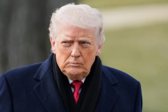 U.S. Navy ship escorting oil tanker in the Strait of Hormuz