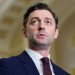 Senator Jon Ossoff speaking during a television interview about Donald Trump