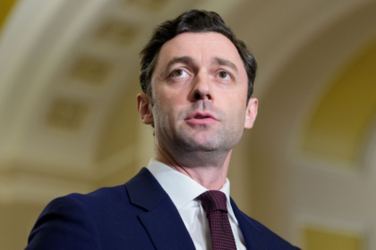 Senator Jon Ossoff speaking during a television interview about Donald Trump