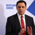 Keir Starmer speaking at press conference with cabinet ministers in support