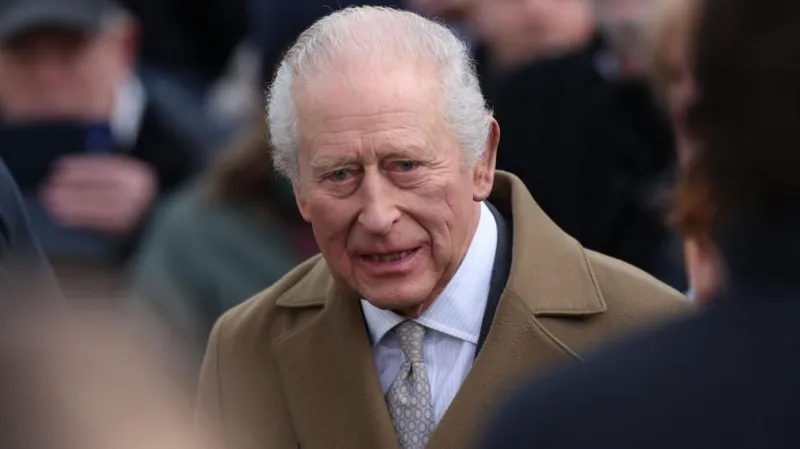 King Charles speaking to media outside Buckingham Palace