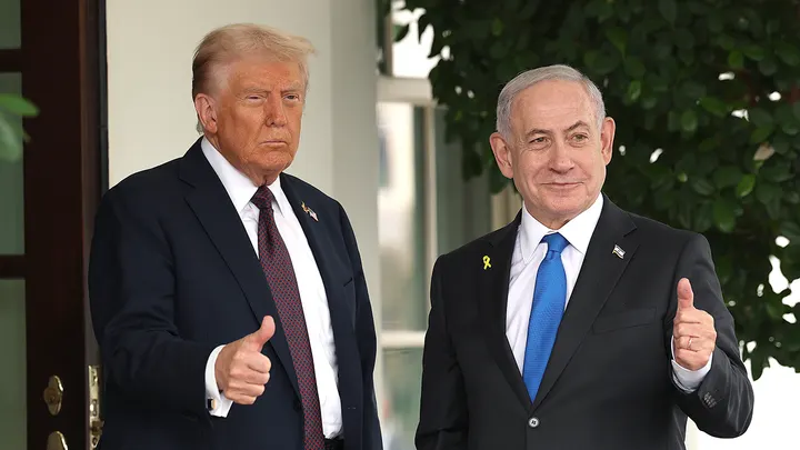 Netanyahu shaking hands with Trump ahead of U.S. visit to discuss Gaza and Iran