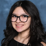 Ofelia Torres smiling with her father Ruben Torres Maldonado