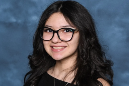 Ofelia Torres smiling with her father Ruben Torres Maldonado