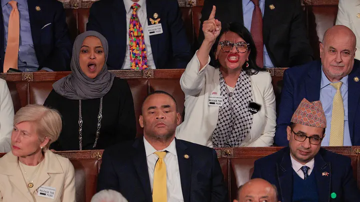 Rashida Tlaib wearing an F ICE pin during President Donald Trump’s State of the Union address