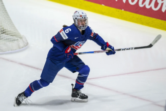 Rory Guilday prepares to play for the U.S. Olympic women’s hockey team after overcoming chemotherapy and vision challenges.
