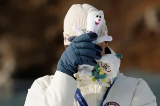 Norwegian biathlete Sturla Holm Laegreid wins Olympic bronze and confesses to cheating on his girlfriend live on TV, calling it his biggest mistake.