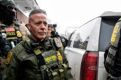 Federal agents outside a 7-Eleven in Minneapolis following reported denial of service