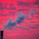 Power plant smokestacks releasing emissions as EPA climate rule faces repeal