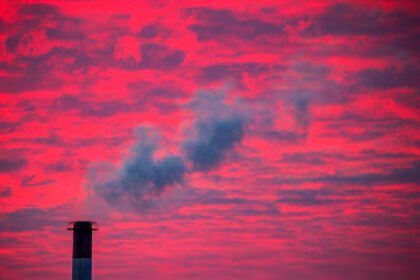Power plant smokestacks releasing emissions as EPA climate rule faces repeal