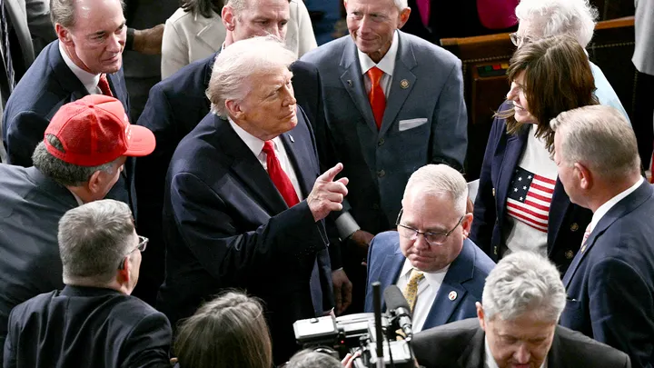 President Donald Trump speaking before Congress during the State of the Union address outlining legislative priorities