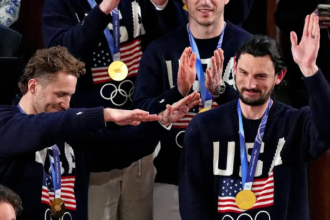 President Donald Trump introducing the gold medal winning Team USA men’s hockey team during the State of the Union as lawmakers applaud