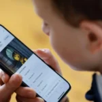 Screen Time for Young Children: Risks, Guidance, and Practical Steps for Parents Screen use is now part of everyday life, but for children under five it needs careful control. Health and education guidance suggests limiting screen exposure to protect early development. For children under two, screen use should be minimal and, if used, shared with an adult. For ages two to five, the recommended limit is about one hour per day. What Screen Time Includes Screen time refers to any time spent using digital devices. This includes mobile phones, tablets, computers, and television. Research shows that nearly all children are exposed to screens by the age of two, which makes early habits especially important. Why Too Much Screen Time Can Be Harmful Young children’s brains develop rapidly, especially in the first five years of life. Around 90% of brain development happens before the age of five. During this period, children need real human interaction to build language, social, and emotional skills. Excessive screen use can affect: Language development, with some children speaking fewer words Social skills and emotional understanding Sleep patterns, especially when screens are used before bedtime Eyesight and physical health Healthy weight and activity levels Studies show a clear pattern. Children who spend several hours daily on screens often show weaker language skills compared to those with limited screen use. How Parents Can Manage Screen Time Managing screen time can feel difficult, especially with busy schedules. However, small changes can make a big difference. 1. Lead by example Children learn by observing adults. If parents reduce their own screen use, children are more likely to follow. 2. Create screen free routines Keep meals free from screens and encourage conversation Replace bedtime screens with reading or storytelling Avoid background television during family time 3. Focus on interaction Talk to children often, even babies. Treat them as active participants in conversations. This helps build language and thinking skills. 4. Use built in controls Most smartphones and tablets include tools like timers and app limits. These features can help control usage without constant supervision. 5. Encourage alternative activities Offer simple activities such as drawing, outdoor play, puzzles, or storytelling. These support creativity and development. Why Interaction Matters More Than Screens Human interaction plays a key role in early learning. Speaking, playing, and engaging with children helps develop language and thinking skills far more than passive screen watching. Even short moments of focused interaction can support emotional regulation for both children and parents. Slowing down and engaging with a child at their pace can improve connection and reduce stress.