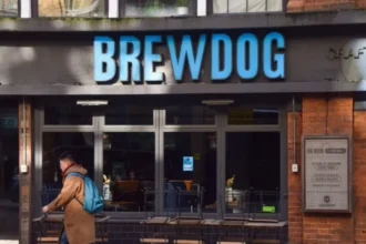 Bars close and hundreds lose jobs as US firm buys Brewdog in £33m deal