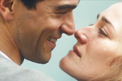 Love Story 2026 Becomes a Breakout TV Hit for Nostalgia, Fashion, and Music Why audiences are drawn to a pre digital feeling world The success of Love Story reflects a strong audience desire for life before smartphones and social media. Viewers feel tired of constant online noise and fast news cycles. The show offers a return to a slower world where daily life feels more social, physical, and spontaneous. Some viewers feel nostalgia for the 90s. Others experience something called anemoia, which is a longing for a time they never actually lived through. This gives younger audiences a sense that the past feels new, stylish, and exciting rather than familiar. New York city as a central character The show highlights New York as more than just a setting. It plays a key role in shaping the story. The characters move through fashion events, cafes, night spots, and busy offices, creating a lifestyle that feels ambitious and glamorous. Fans have also started visiting real locations featured in the series. Some restaurants have reported a rise in bookings after appearing on screen. This shows how strongly the series connects fiction with real world places and experiences. Strong cast chemistry and rising talent The lead actors have become a major reason for the show’s popularity. Their on screen connection feels natural and engaging, which helps viewers stay invested in the story. One of the lead performers had limited acting experience before this role, yet delivers a standout performance. The other lead has more experience and is now being seen as a potential award contender because of her emotional depth and screen presence. Fashion influence and 90s style revival Fashion plays a major role in the show’s appeal. The minimalist 90s style seen in the series has quickly become popular again. Viewers are recreating outfits inspired by the characters, especially clean monochrome looks and simple accessories. Search trends show a strong rise in interest in certain fashion brands featured in the show. Social media users are also copying hairstyles, clothing choices, and street style inspired by the characters. At the same time, some critics argue that copying celebrity style does not replace personal identity. Soundtrack that defines the mood The music in Love Story has received wide praise. The soundtrack blends popular 90s dance tracks with softer, emotional songs that match the tone of each scene. Many viewers say the music deepens emotional moments in the story. Certain scenes have gone viral because of how strongly the songs connect with character experiences, making the soundtrack a key part of the show’s identity. Public debate and controversy The series has also sparked debate. Early promotional images received criticism for their styling choices. Relatives connected to the real life inspiration of the story have raised concerns about how personal histories are portrayed. There has also been discussion about how some real people are represented in the show. While some viewers enjoy the dramatization, others feel certain portrayals are unfair or exaggerated. Despite this, attention and conversation around the series continues to grow.