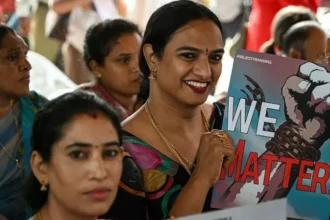 India’s controversial transgender rights bill sparks protests The Indian parliament passed a law that changed the way transgender individuals are recognized legally, causing protests by opposition parties and members of the LGBTQ community. This legislation amends the 2019 Transgender Persons Act (Protection of Rights), focusing on defining a transgender individual. The Bill's Purpose as a Bill of the Government The new law, according to officials, aims at making welfare benefits easier to access and strengthening protections against trafficking and exploitation. The argument is that by defining transgender identities more narrowly, it will be easier to direct resources, like healthcare or job reservation, towards the marginalised. It also requires medical certification and the district authorities to certify those who undergo gender affirming surgery. The bill includes traditional Indian identities and intersex people. Critics Raise Concerns The activists argue that the bill is a departure from the principle of self-identification established by India's Supreme Court, in 2014. This court recognised transgender individuals as "third gender." The activists warn that these changes may exclude transgenders, gender-fluids, and non-binary people. Laxmi Tripathi said that the transgender identity has been shattered. Grace Banu said, "We seek recognition without intrusion and without humiliation." The lawyers also made the point that medical certification is a violation of dignity and privacy. Panel Advisory and Opposition Reaction The Supreme Court appointed advisory panel has called on the government to pull the bill. The panel said that removing the self-identification would violate the 2014 ruling of the Supreme Court and called for wider consultation. The opposition parties criticised this legislation as "draconian." In the last two weeks, the LGBTQ community has protested in many Indian cities. Transgender People continue to face challenges in India India has an estimated two million transgender people, although activists claim the true number is much higher. Many face discrimination despite legal recognition in the areas of education, health care, and formal employment. Many rely on informal or traditional work in order to make ends meet. This new law has rekindled debates on how India can balance protection, welfare and rights of the transgender population.