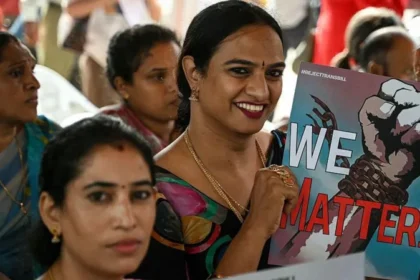 India’s controversial transgender rights bill sparks protests The Indian parliament passed a law that changed the way transgender individuals are recognized legally, causing protests by opposition parties and members of the LGBTQ community. This legislation amends the 2019 Transgender Persons Act (Protection of Rights), focusing on defining a transgender individual. The Bill's Purpose as a Bill of the Government The new law, according to officials, aims at making welfare benefits easier to access and strengthening protections against trafficking and exploitation. The argument is that by defining transgender identities more narrowly, it will be easier to direct resources, like healthcare or job reservation, towards the marginalised. It also requires medical certification and the district authorities to certify those who undergo gender affirming surgery. The bill includes traditional Indian identities and intersex people. Critics Raise Concerns The activists argue that the bill is a departure from the principle of self-identification established by India's Supreme Court, in 2014. This court recognised transgender individuals as "third gender." The activists warn that these changes may exclude transgenders, gender-fluids, and non-binary people. Laxmi Tripathi said that the transgender identity has been shattered. Grace Banu said, "We seek recognition without intrusion and without humiliation." The lawyers also made the point that medical certification is a violation of dignity and privacy. Panel Advisory and Opposition Reaction The Supreme Court appointed advisory panel has called on the government to pull the bill. The panel said that removing the self-identification would violate the 2014 ruling of the Supreme Court and called for wider consultation. The opposition parties criticised this legislation as "draconian." In the last two weeks, the LGBTQ community has protested in many Indian cities. Transgender People continue to face challenges in India India has an estimated two million transgender people, although activists claim the true number is much higher. Many face discrimination despite legal recognition in the areas of education, health care, and formal employment. Many rely on informal or traditional work in order to make ends meet. This new law has rekindled debates on how India can balance protection, welfare and rights of the transgender population.
