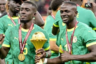 Senegal Appeals AFCON Final Decision as CAS Speeds Up Review Senegal has taken its Africa Cup of Nations final dispute to the Court of Arbitration for Sport, which says it will handle the case as quickly as possible. The team had originally beaten Morocco 1-0 in the final on 18 January. But that result didn’t stand for long. It was later changed to a 3-0 win for Morocco after a controversial turn of events. What Happened in the Final Tension rose in the final moments of the match when Morocco were awarded a stoppage-time penalty. Senegal’s players strongly disagreed and walked off the pitch in protest. They did return later, but the damage was already done. The Royal Moroccan Football Federation filed a complaint after the match. The Confederation of African Football reviewed the situation and ruled that Senegal had forfeited the game. As a result, the scoreline was officially recorded as 3-0 in Morocco’s favor. Senegal Fights Back Senegal is not backing down. The team has appealed the decision and wants the title restored. CAS Director General Matthieu Reeb said they know how important this case is for both teams and fans. He added that the process will move quickly, but both sides will still get a fair chance to present their case. There is no exact timeline yet for when the final decision will be announced. What Happens Next According to sports expert Raymond Hack, the case could take several months to settle. If that happens, it may still be ongoing during the World Cup. For now, everything depends on CAS. Senegal waits, hoping the decision goes in their favor.