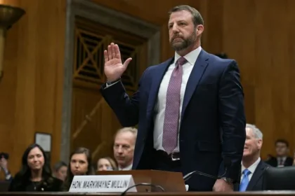 Markwayne Mullin is confirmed as Homeland Security chief by the Senate In a vote of 54-45, the US Senate confirmed Markwayne Mullin to be the next head of Homeland Security. The confirmation of Senator Markwayne Mullin is the last step in an approval process that was completed quickly. Mullin is now in charge of the key areas for national security, such as immigration enforcement, border security, and airport safety. It is anticipated that he will be sworn into office soon. Mullin was nominated by President Donald Trump on 5 March after Kristi Noem resigned as Homeland Security Secretary. She had served just over one year and then she was replaced due to political controversy. Markwayne Mullin's Background Mullin was first elected to the Senate in a special elections. He spent 10 years in the House of Representatives before that. His background is as a mixed martial artist. He has been a vocal supporter of Trump's immigration policy, and has supported efforts to curb undocumented migrants. The Confirmation hearing and the Political Debate Mullin was a witness before the Senate and House committees during his confirmation. Mullin pledged to "take a better approach" in immigration enforcement, while also promising to protect everyone equally. He welcomed Trump's nomination on social media and expressed his support for the plan to restore law and security at border crossings and strengthen border protection. The hearing was not without strong disagreements. Rand Paul, the lone Republican to vote against him. Paul raised questions about Mullin's previous comments on political violence, and questioned his suitability to the position. Democratic Senators questioned Mullin about his comments in the past regarding Alex Pretti. Pretti was killed by federal agents during an incident that occurred back in January. Mullin apologized for his remarks but did not apologise as the investigation is still ongoing. In his new position, he also said he will avoid similar remarks. Immigration Enforcement: Views Mullin was asked about the way Immigration and Customs Enforcement will operate under his direction. He stated that agents will normally use judicial warrants to enter properties, except when they are actively seeking a suspect. The minister also stated that he wanted the Department to focus less on daily headlines, and more on public safety and stability. The Government Shutdown: What to Expect The confirmation of his appointment comes amid a partial funding crisis linked to disagreements over immigration policies. Trump's administration blamed Democrats who blocked funding bills without immigration reforms. Mullin has warned the shutdown could threaten public safety as well as national security if it persists.