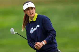 Michelle Wie West Ends Retirement for Final US Women’s Open Appearance Golf Star Plans One Last Major Return Michelle Wie West has announced she will come out of retirement to compete in the US Women’s Open later this year. The 36-year-old confirmed that this will likely be her final appearance at the prestigious tournament. The former champion last played competitively three years ago. Now, she wants to make the most of her final year of eligibility before stepping away again. Special Exemption Gives Final Opportunity Wie West earned lifetime recognition after winning the US Women’s Open in 2014. Under tournament rules, winners can return for ten years. However, her eligibility was extended to 2026 due to maternity leave. She shared her excitement about returning, especially since the event will take place at Riviera, a course that holds personal meaning for her. The tournament is set to begin on 4 June in Pacific Palisades, California. A Career That Started Early Wie West became a global name at a very young age. At just 13, she became the youngest player to win an adult USGA championship. A year later, she made history again by becoming the youngest golfer to make the cut at a major event. Because of her early success, many compared her to legends like Tiger Woods. Expectations were high, and she remained in the spotlight for more than two decades. Challenges and Retirement Decision Despite her achievements, injuries and physical strain took a toll on her body. After years of competing at the highest level, she decided to step away from professional golf. At the time, she explained that her body could no longer handle the demands of the sport. She chose to focus on her health and family life, as she is now a mother of two. Return Beyond the US Open This comeback is not limited to just one event. Earlier this year, Wie West also revealed plans to participate in the women’s version of TGL later in the year.