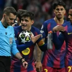 The controversy surrounding match incidents Barcelona has raised concerns following their Champions League elimination, claiming that key refereeing decision changed both legs' direction. They claim that the officials' mistakes directly affected the result of the match. The club believes that several incidents were handled incorrectly under the rules. Barcelona claims that in both games, important decisions were made against them during key moments of play. The red cards and the VAR decisions under scrutiny Pau Castrorsi was the first to be sent off after being found guilty of denying an obvious scoring opportunity. Eric Garcia was also shown a red in the second game after a pitch-side review led to the referee upgrading a yellow. Barcelona also questioned a decision involving Atletico defender Marc Pubill. He was accused of handling the ball in the penalty box, yet the game continued with no intervention by VAR or referee. These moments, according to the club, show inconsistent VAR use and decisions in both matches. Barcelona files formal complaint with UEFA Barcelona complained first after the first leg. They cited what they deemed a severe lack of VAR interventions. UEFA rejected this complaint later. The club filed a formal complaint after the second leg. The club claimed that several decisions were not in accordance with the rules of the game. Barcelona said that officials had also applied rules incorrectly to several important situations. The repeated mistakes had an impact on match results, causing both financial and sporting damage. Reaction of players and clubs Raphinha was a forward who had missed both games due to an injury. She strongly criticised refereeing in the aftermath of the second match. He called the decision-making unfair, and said that it felt like the referees had robbed both matches. Later, the club released a press release stating that they were willing to collaborate with UEFA in order to improve standards of refereeing. The club stressed that VAR should be used more fairly and transparently, and the match officials must also follow this. Club position and result Barcelona insists that refereeing errors, not pure athletic performance, determined the result. The group continues to call for a review of the officiating standard in all major tournaments.