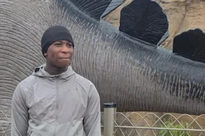 Boy, 14, Fatally Shot in Woolwich: Police Appeal for Information Incident Overview A 14-year-old boy, identified as Eghosa Ogbebor, was shot dead in Woolwich, southeast London. Police received reports of gunfire on Lord Warwick Street at around 3:40 pm BST on Thursday. Emergency services arrived quickly and tried to help him, but he sadly died at the scene. Authorities have informed his family. Arrests and Investigation Police have arrested two boys, aged 14 and 16, along with an 18-year-old man on suspicion of murder. Detectives are continuing their investigation and are asking the public for help. They are also requesting any CCTV or dashcam footage that could assist with the case. Witness Accounts People in the area described a frightening scene. Customers at a nearby pub, The Greyhound, rushed inside after hearing gunshots. Staff and witnesses reported panic as people tried to secure the doors and stay safe. A staff member, Sofia Pereira, said she heard a loud bang and saw people running into the pub in fear. She mentioned that one individual appeared to be carrying a weapon, which added to the panic. Local Reaction Residents expressed shock over the incident. One 18-year-old local said the shooting felt unreal and unsettling. She also noted that there has been increasing violence in the area over recent years, making the situation even more concerning. Police Appeal Authorities are urging anyone with information to come forward. They believe even small details could help move the investigation forward.