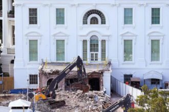 Court Allows Construction to Resume on White House Ballroom Appeals Court Lifts Halt on Work A US appeals court has allowed construction work on Donald Trump’s White House ballroom project to continue. The decision gives the administration permission to move ahead with both underground and above ground development until the next hearing on 5 June. The court granted an administrative stay after the government challenged a previous order that had stopped the above ground work. That earlier ruling came from a federal judge who raised concerns about legal approval procedures. Judge Raises Legal Concerns Judge Richard Leon had earlier blocked parts of the construction. He said the project likely needed approval from Congress before starting. He also questioned claims that national security needs justified bypassing standard procedures. Leon stated that national security cannot be used to override legal requirements. His ruling followed concerns that officials may have reclassified the project to avoid oversight rules. Government Defends the Project The Trump administration argued that stopping construction would create security risks and leave a large unfinished structure near the Executive Residence. Officials also said the ballroom project includes secure underground facilities such as medical support areas and protective shelters. They claimed the project supports safety needs for high level meetings and presidential security. Donald Trump also defended the project on social media. He said the ballroom is necessary for large diplomatic gatherings and accused the court of blocking essential security improvements. He insisted that no judge should be able to stop it. Legal Challenge From Preservation Group The dispute began after a historic preservation organization filed a lawsuit. The group argued that construction started without proper approval from the National Capital Planning Commission. They also said the administration did not seek required congressional authorization before beginning work on the ballroom and underground structure. The group claimed this violated federal planning rules that protect historic government buildings. Next Steps in the Case The appeals court has not issued a final decision. Instead, it has paused the earlier ruling and allowed construction to continue for now. The next court hearing is scheduled for 5 June, where judges will review the legal and security arguments in more detail.