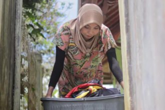 Indonesia Grants Legal Rights to Domestic Workers After 22 Years of Advocacy Parliament passes long-awaited protection law Indonesia has approved a landmark law that formally recognises domestic workers as protected employees, ending more than two decades of advocacy. The legislation covers millions of workers who were previously excluded from national labour protections. The new law follows a long campaign that began in 2004 and faced repeated delays before gaining momentum again in 2020. Advocates say its approval marks a major shift in how domestic work is viewed in the country. Millions of women gain legal protection Indonesia has around 4.2 million domestic workers, and nearly 90 percent are women. Many of them have worked without formal contracts or legal safeguards, often under informal arrangements. With the new law, domestic workers will now be eligible for health insurance, pensions, and guaranteed rest days. The law also bans wage deductions by placement agencies and sets the minimum hiring age at 18, aiming to reduce child labour in the sector. Emotional response from workers The decision triggered emotional reactions among domestic workers who have waited years for recognition. One worker described the law as the result of a long struggle for dignity and protection. Others said they finally felt seen after years of uncertainty and lack of legal rights. Rights groups warn implementation is key Labour rights organisations welcomed the legislation but stressed that enforcement will be crucial. They warned that legal recognition alone will not immediately solve long standing issues such as low wages and workplace abuse. One advocacy group noted thousands of reported cases of violence against domestic workers in recent years, including both physical and psychological abuse. It also called for public awareness campaigns so employers clearly understand their new responsibilities. One year for full implementation Government regulators now have one year to develop detailed rules for enforcing the law. These guidelines will determine how protections are applied in practice across the country. Experts say the real impact of the law will depend on how effectively it is implemented and whether domestic workers can actually access the rights now guaranteed on paper.