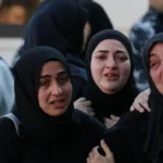 Israel Lebanon Conflict Escalates as Strikes Intensify and Talks Approach Escalation of Violence in Southern Lebanon and Northern Israel Israeli air strikes and Hezbollah rocket fire increased over the weekend across southern Lebanon and northern Israel. Both sides signaled that fighting would continue despite growing diplomatic activity. The conflict has expanded since early March after renewed clashes between Israel and Hezbollah. Israel says its military campaign targets Hezbollah positions in Lebanon. Hezbollah continues rocket attacks toward northern Israel in response. Rising Civilian and Military Casualties Lebanese health authorities report that Israeli strikes have killed 2055 people in Lebanon since fighting resumed on 2 March. They also say 167 people died since Friday. Israel reports that Hezbollah attacks have killed 12 soldiers and 2 civilians during the same period. Among recent civilian victims was a child, around two years old. She survived an earlier strike on her home in southern Lebanon. She later died when another strike hit during her father’s funeral. Her seven year old sister suffered severe burns and remains in hospital. A Red Cross rescuer also died during weekend operations. The organization says a drone strike hit its team while they carried out a humanitarian mission. The Israeli military has not confirmed this claim. Diplomatic Efforts and Upcoming Talks Officials from Lebanon, Israel, and the United States plan to meet in Washington on Tuesday. Lebanese officials say the talks aim to set conditions for a ceasefire. If progress is made, formal negotiations may follow. Lebanon continues to push for an end to the war and a full Israeli withdrawal from its territory. Israel, however, states it will not negotiate a ceasefire with Hezbollah under current conditions. Statements from Political Leaders Lebanon’s prime minister said diplomatic efforts continue despite heavy fighting. He emphasized ongoing negotiations aimed at stopping the war. Israel’s prime minister maintained a firm position while visiting troops in southern Lebanon. He said Israeli forces would continue operations in what he described as a security zone. Israel says this zone extends up to ten kilometers inside Lebanese territory to prevent attacks on Israeli communities. Disputed Military Claims Israeli forces claim they killed more than 20 Hezbollah fighters operating from a hospital area in Bint Jbeil. Lebanese authorities deny this and accuse Israel of striking civilians and medical facilities. Heavy air strikes were also reported in multiple towns in southern Lebanon, including areas that saw major fighting during earlier conflicts between Israel and Hezbollah.