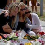 Bondi Beach Attack Report Highlights Prior Security Warning Early threat alert before the incident A Jewish security group warned New South Wales police about a high threat level before the Bondi Beach attack. The warning came days before the incident during a planned Hanukkah related gathering. The group shared concerns about upcoming events and asked for stronger police protection. Police received this information on 8 December. Details of the Bondi Beach shooting The attack took place on 14 December at a public event in a beachside park. Two attackers used firearms and opened fire on people attending the gathering. Police responded at the scene and stopped the attackers. The father was killed during the response. The son survived with serious injuries and was later taken into custody. Authorities charged the son with 59 offences, including multiple counts of murder and one terrorism related charge. Inquiry findings and recommendations A royal commission led by former High Court judge Virginia Bell reviewed the incident. The interim report identified gaps in security response and coordination. The report issued 14 recommendations. These include stronger gun control measures and wider use of special policing arrangements during major community events. It also suggested extending protection plans used for high holy days to other Jewish community gatherings. Government response The Prime Minister confirmed that the National Security Committee accepted all recommendations. Authorities plan to apply the changes across relevant security agencies.