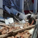 A powerful 7.4 magnitude earthquake struck off Indonesia near Ternate, causing one death, injuries, and brief tsunami warnings before they were lifted.