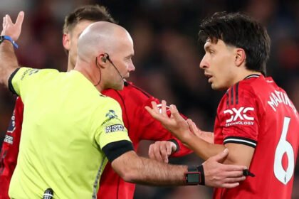 Manchester United fall behind Leeds as Lisandro Martinez is sent off for hair pulling Manchester United's Lisandro Martinez received a red card during an intense match against Leeds United for pulling Dominic Calvert Lewin's hair. Old Trafford was the scene of an incident that changed the outcome of the game. Red Card After VAR Review Paul Tierney initially missed this foul. The Video Assistant referee then intervened, asking him to view the incident in the pitchside monitor. Tierney gave a red card after watching the replay. Martinez's hair pulling action was confirmed as violent conduct by Tierney. Premier League Match Centre also confirmed the decision, stating that the card had been given following a VAR full review. Manchester United already under pressure Manchester United was already in a bad situation at the time. The team was already trailing by 2-0 thanks to Noah Okafor's two goals in the first half. Martinez's dismissal has made United's situation even worse, as they are now down to ten players for the rest of the game. Confirmation of Three-Match Ban Martinez will be suspended for three matches following the red card. It is a blow to United because Martinez had only recently returned to play after recovering from an injury in his calf. This was his first Premier League appearance since the West Ham United 1-1 draw in early February. The Key Moment that Changed the Game Martinez was fouled when he tried to stop Calvert Lewin while he was attacking. He grabbed his hair instead of making a clear challenge. This caused immediate controversy. These moments can be costly and had an impact on the outcome of the match.
