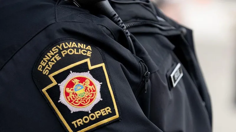 Tragic House Explosion in Clinton County A devastating explosion destroyed a home in Lamar Township, Clinton County, Pennsylvania, on Sunday morning. Authorities confirmed that a 34 year old mother and her six children died in the incident. The children included four boys and two girls, aged between three and eleven. Emergency services arrived at about 08:30 local time after reports of an explosion. They found the house fully on fire and heavily damaged. Fire Spread Before Rescue Could Begin Firefighters reached the scene quickly but faced extreme conditions. The flames spread through the structure at high speed. Officials reported that responders could not safely enter the home to search for survivors. The intensity of the fire caused part of the house to collapse before rescue operations could begin inside the structure. Suspected Cause Under Investigation Investigators believe a propane leak inside the home may have triggered the explosion. However, they have not confirmed the final cause yet. Authorities continue to examine the site and gather evidence. Police stated that the investigation remains active and further findings will be shared once available. Witness Account of the Explosion A nearby resident described hearing a loud blast during breakfast. She said the impact was strong enough to be felt inside her home. She looked outside and saw flames coming from the house. Within a very short time, the entire structure was engulfed in fire. Other neighbors rushed out to call emergency services. Fire crews arrived soon after but reported that the fire had already consumed most of the building. Community Reaction and Ongoing Inquiry The local community expressed shock and grief over the loss of a young family. Neighbors described the fire as fast and overwhelming, leaving almost no time for intervention. Authorities continue to investigate the explosion to determine exactly what caused the propane leak and how the fire spread so quickly.