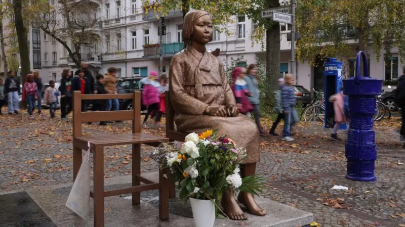 New Zealand rejects a comfort women statue in Auckland after Japan raises diplomatic concerns. The decision highlights tensions over World War II history and community impact.