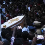 Indian police officers sentenced to death for deaths in custody Case Background In India, nine police officers have been found guilty for the murder of a father in prison and his son during the lockdown 2020 Covid. This case occurred in Tamil Nadu where victims were arrested after allegedly maintaining their mobile store open during the restrictions. P Jeyaraj, and Benicks his son, both died soon after they were arrested. They were beaten brutally inside the jail, according to court testimony. The Brutality of Custody According to the sentencing judge, both officers were stripped naked and assaulted in public by police officers. The judge determined that both men were assaulted and stripped in front of each other. The officer also said that they had abused their power and shown no respect for life. Court's Verdict Last month the court found them guilty, and the judge handed out the death sentence on Monday. The judge rejected all requests for leniency, and stated that the defendants should not be given a reduced sentence based on age or background. All the police officers had been educated, and were fully accountable for their actions. In 2020, one of the accused officers died due to Covid. The remaining nine have been sentenced. They can appeal. Public Reactions and Protests Tamil Nadu was enraged by the case. Public figures and opposition leaders raised their voices in support of justice. Social media was flooded with messages of support from prominent personalities including politicians and an Indian cricketer. Wider Concerns about Police Brutality The case brought to light the brutality of police in India. Human rights organizations report that hundreds die each year in police custody. The fact that they also mention the use of torture to obtain confessions raises serious questions about police practices. In early this year, experts from the United Nations urged India's police system to be aligned with international standards for human rights.