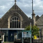 Police Confirm No Rape Outside Epsom Church After Investigation Surrey Police have closed their investigation into an alleged rape outside a church in Epsom. Officers confirmed that no sexual offence took place. The case began when a woman in her 20s reported that she had been raped outside Epsom Methodist Church on 11 April. She had just left Labyrinth nightclub earlier that night. Her report quickly spread, causing concern across the town. Investigation Findings Police carried out a detailed investigation. They reviewed CCTV footage, spoke to witnesses, conducted house visits, and completed forensic tests. After examining all evidence, officers found no sign of a sexual assault. Instead, they believe the woman suffered an accidental head injury during her night out. This injury likely caused confusion, which led to the initial report. Authorities confirmed that the woman agreed to share this update. She is still receiving support from relevant services. A police spokesperson said they treat every report of sexual offences seriously and handle each case with care and sensitivity. Public Reaction and Disorder The initial report triggered strong public reactions. Large groups gathered in Epsom, demanding information about suspects. However, police did not release any descriptions due to a lack of confirmed details. As tensions rose, protests turned disruptive. Some individuals threw objects at police officers. Authorities responded by deploying riot police to control the situation. Five people, aged between 15 and 23, were later arrested. They face charges related to public order offences and criminal damage. All have been released on bail. Misinformation and Community Impact Police also addressed false claims circulating during the unrest. Some people targeted hotels and homes based on rumors that asylum seekers were involved. Authorities stated that these claims were completely untrue. Officials criticized the violence and misinformation. Surrey Police and Crime Commissioner Lisa Townsend described the incidents as “shameful” and “mindless.” She also noted that some individuals involved were not from the local area. Police Statement Surrey Police emphasized their commitment to thorough investigations. They confirmed that this case involved careful evidence review before reaching a conclusion. The force also urged the public to avoid spreading unverified information, as it can lead to unnecessary fear and disorder.