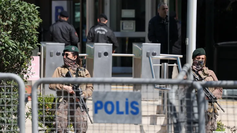 Istanbul Israeli Consulate Shooting: One Gunman Killed, Two Injured After a gun battle with the police, one of two attackers was killed and another injured in a shooting near the Israeli Consulate in Istanbul. The incident has been described by authorities as an act of serious terrorism that raises concerns over security. Attack Near Consulate Sparks Panic In Istanbul, the incident occurred in Besiktas's bustling district where Israel consulates are located. Officials claim that the attackers drove from Izmit to Istanbul in a rental car, and then attacked in broad daylight. The gunfire between suspects and officers lasted several minutes. The witnesses reported that the shooting was loud and continued, causing panic in nearby people. Police Respond, One Attacker Killed The security forces responded quickly to the attack and engaged with the attackers. During the gunfight, one of the attackers was killed and two other suspects were injured. Later, authorities confirmed that two of the suspects were brothers. In the shooting, two police officers also sustained injuries. Two police officers were also injured in the shootout. One was hurt on the leg, and the other got hit by a bullet to the ear. Both officers are in stable conditions and receiving medical attention. Extremist Groups and Suspects The dead attacker was identified by officials as Yunus E.S. The authorities stated that the attacker had links with a religious extremist group, which is widely thought to be Islamic State. No organization has yet claimed official responsibility for this attack. The investigation is also looking into the digital communications between suspects. No Diplomatic Staff Harmed The consulate was empty at the time the attack occurred. It prevented further violence and possible casualties. The police sealed the area off for several hours following the incident. Online videos show an intense police presence at the incident, as well as emergency response teams. The Government condemns the Attack The Turkish president Recep Tayyip Erdoan condemned the attack, calling it an "heinous terror act." Erdogan stressed that such incidents will not disrupt public safety or trust. The authorities have confirmed that the investigation is ongoing and are taking strict measures to avoid similar incidents occurring in future.